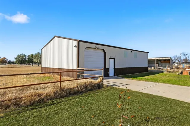 a house view with a backyard space