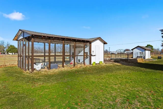 a view of swimming pool with a yard