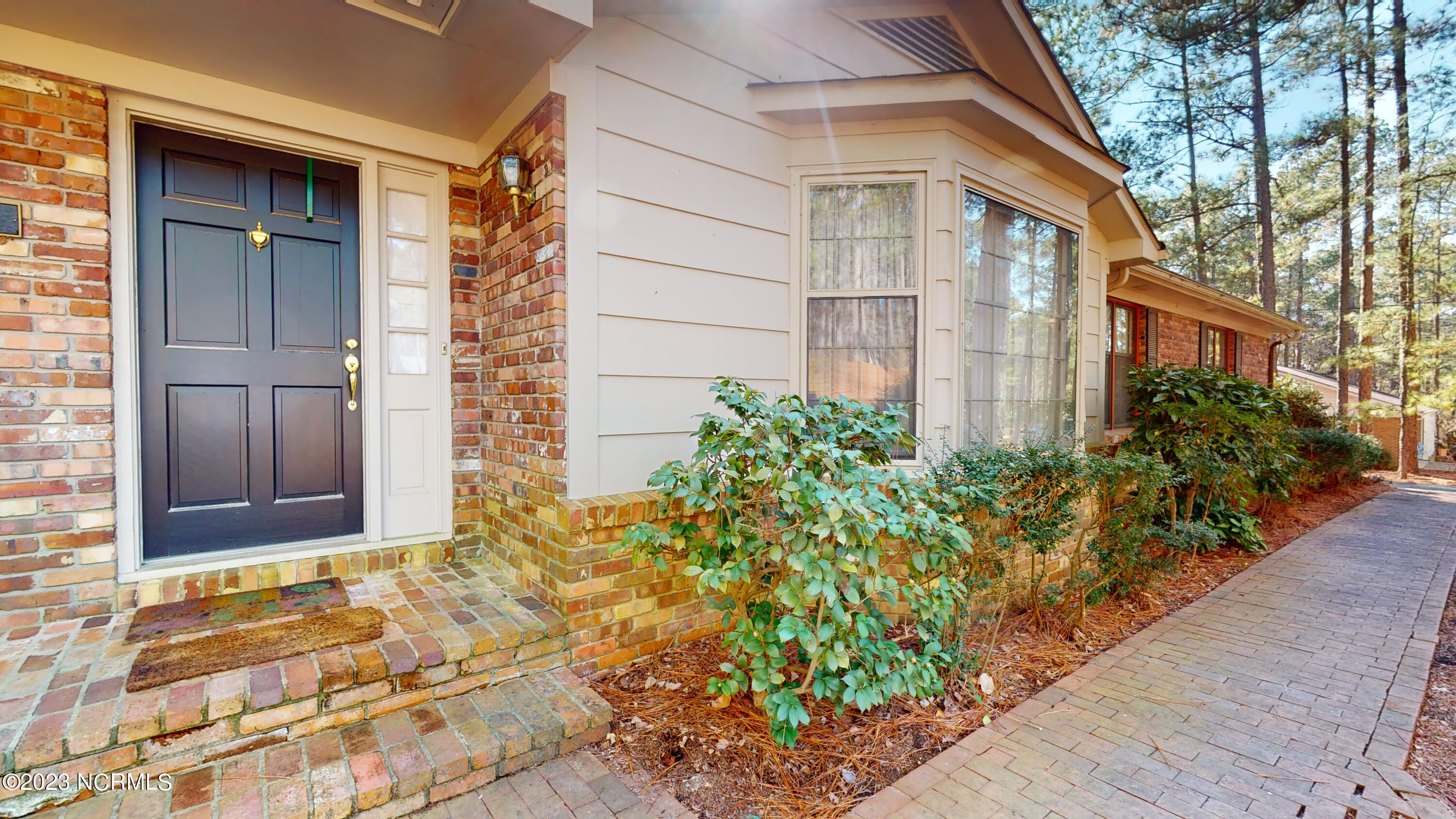 255 Cliff Road Southern Pines, NC 28387 - Photo 2 of 68 Brick Paved entry walk