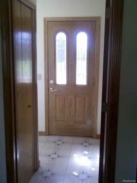 3696 Swarthout Road Pinckney, MI 48169 - Photo 9 of 20 Hall to Pantry & Laundry.jpg