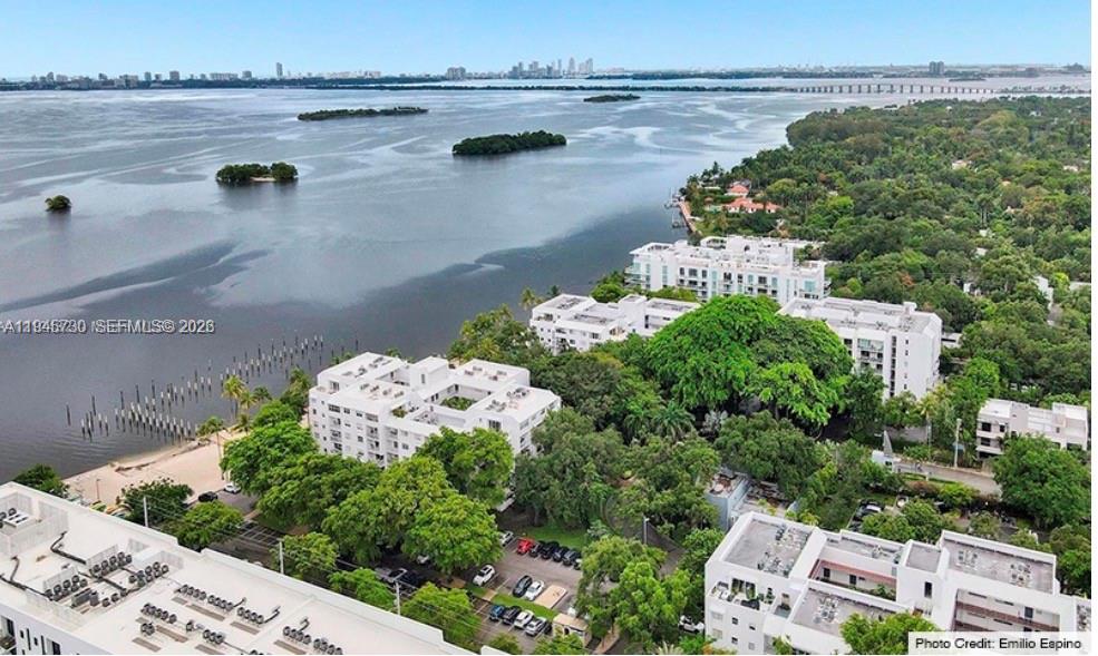 680 Northeast 64th Street, Unit A209 Miami, FL 33138 - Photo 2 of 5 an aerial view of a house with a yard