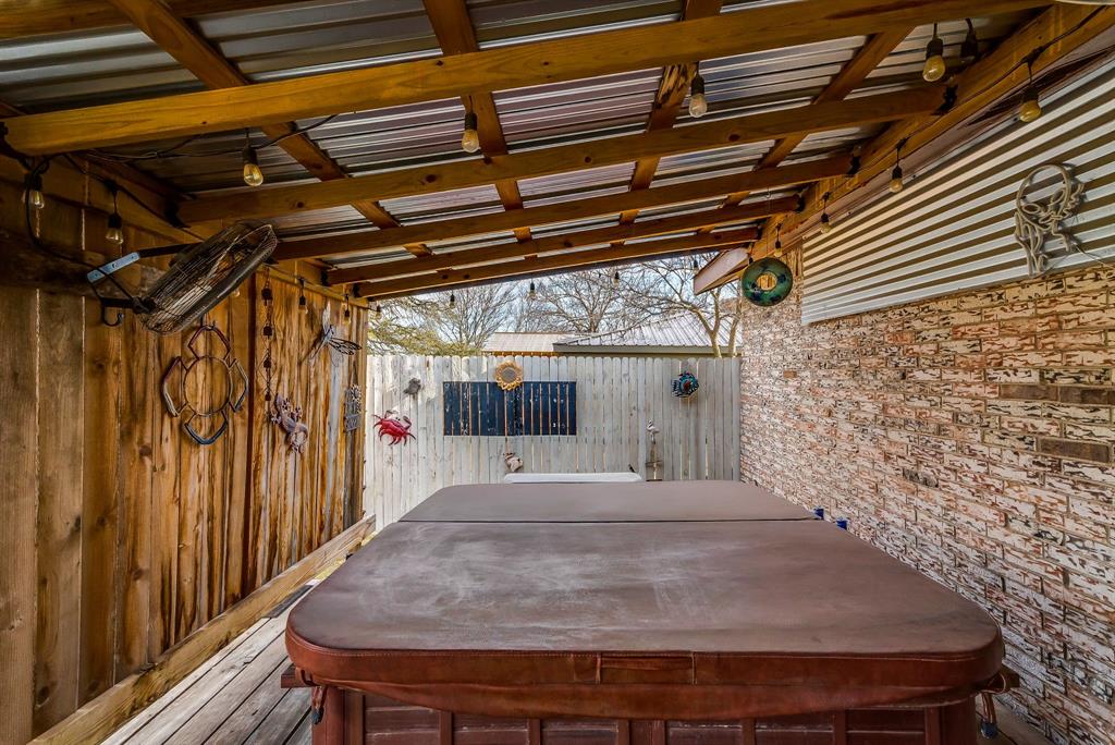 2912 Farm To Market 920 Weatherford, TX 76088 - Photo 23 of 28 Wooden terrace featuring a covered hot tub