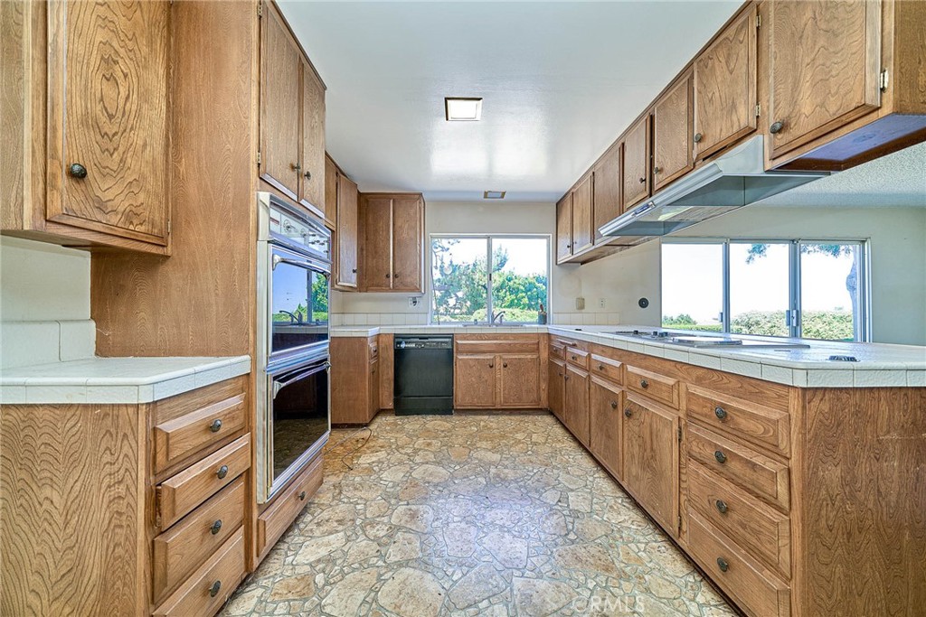 4963 Delacroix Road Rancho Palos Verdes, CA 90275 - Photo 3 of 26 Kitchen looks out the serene backyard