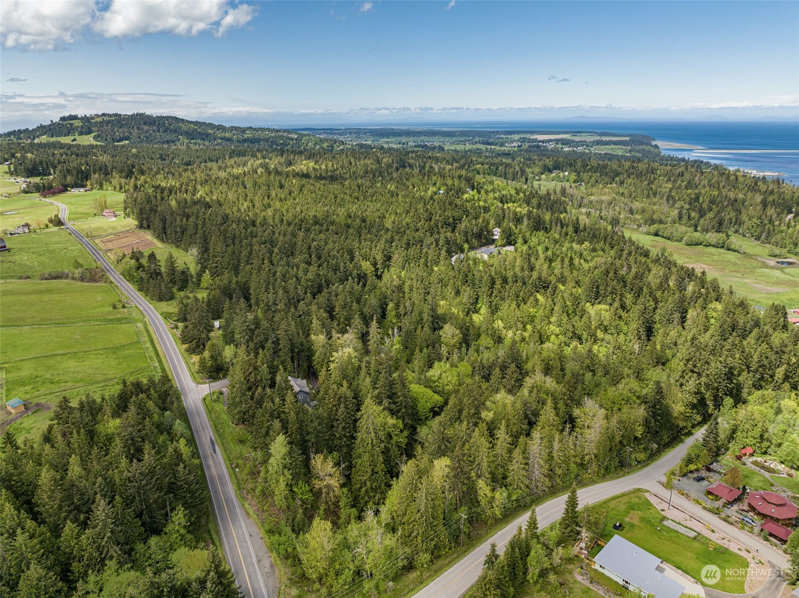 999 Louella Road Sequim, WA 98382 - Photo 1 of 38 a view of a yard from a balcony
