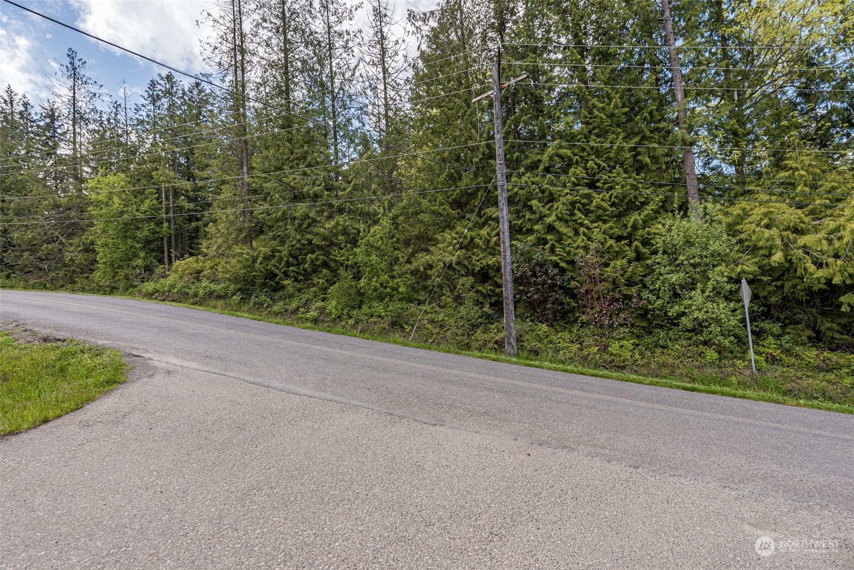 999 Louella Road Sequim, WA 98382 - Photo 25 of 38 a view of a yard and basketball court