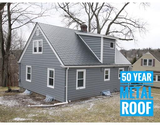 68 Upland Street Worcester, MA 01607 - Photo 16 of 17 a front view of a house with a yard