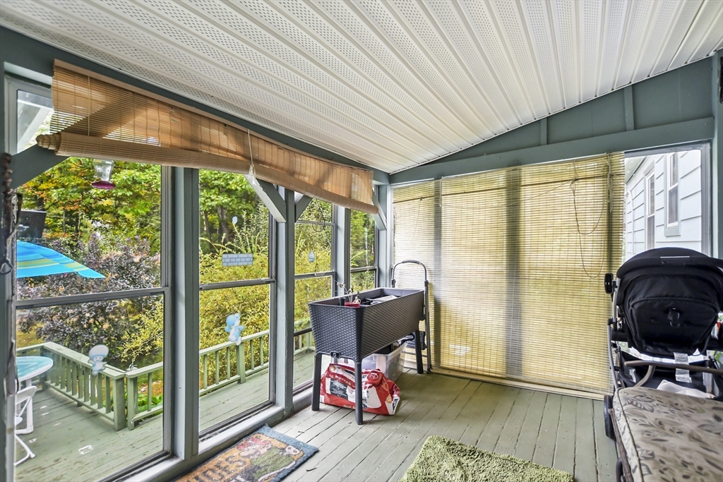 285 Abel Road Rindge, NH 03461 - Photo 27 of 39 a bedroom with furniture and large windows