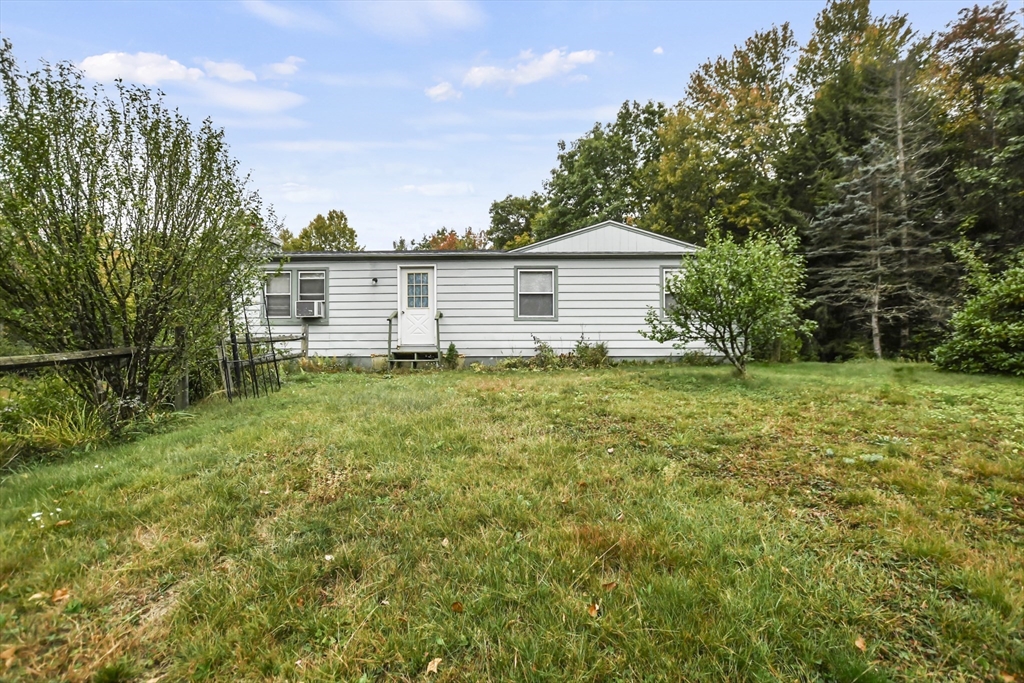 285 Abel Road Rindge, NH 03461 - Photo 39 of 39 a house view with a garden space