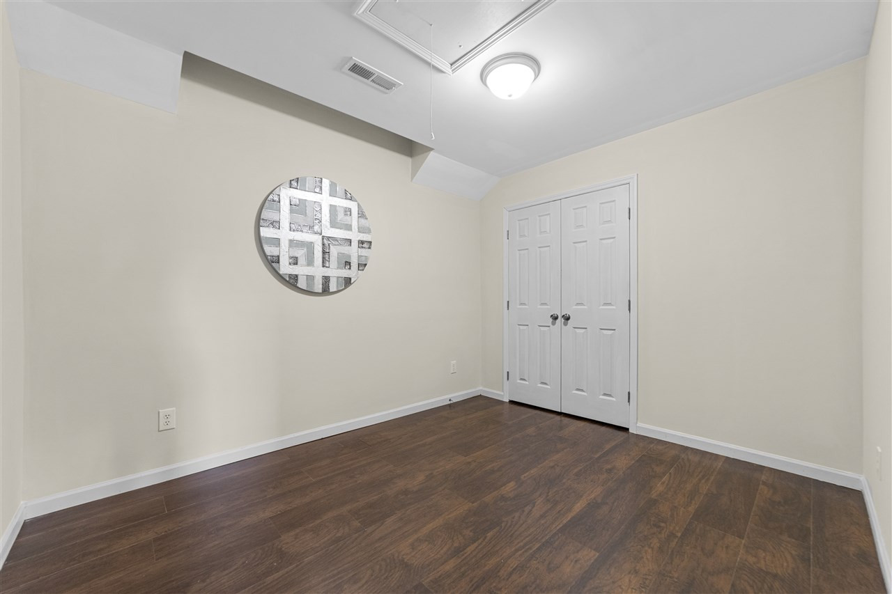 8509 Arboles Court Raleigh, NC 27613 - Photo 20 of 24 Bonus Room