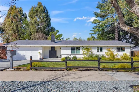 front view of a house with a small yard