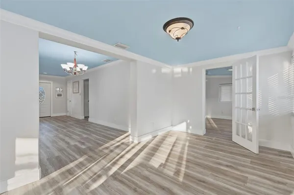 a view of an empty room and window