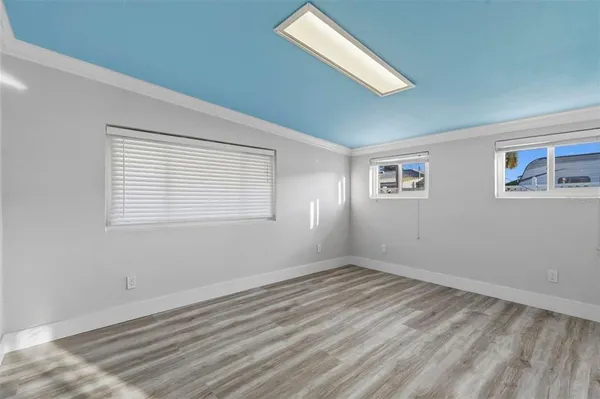 a view of a room that has a window in it