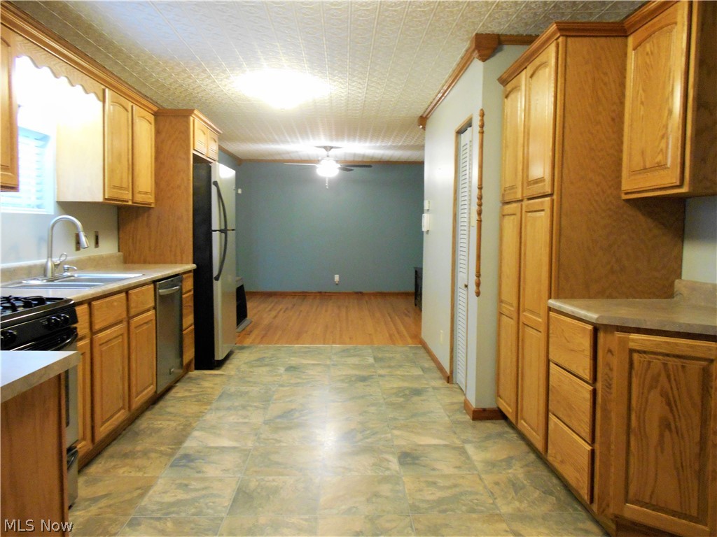 4370 School House Road Little Hocking, OH 45742 - Photo 9 of 35 View of the kitchen looking towards the dining room