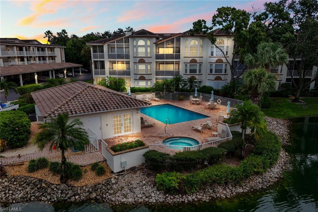6030 Chardonnay Lane, Unit 203 Naples, FL 34119 - Photo 1 of 25 Community pool and spa