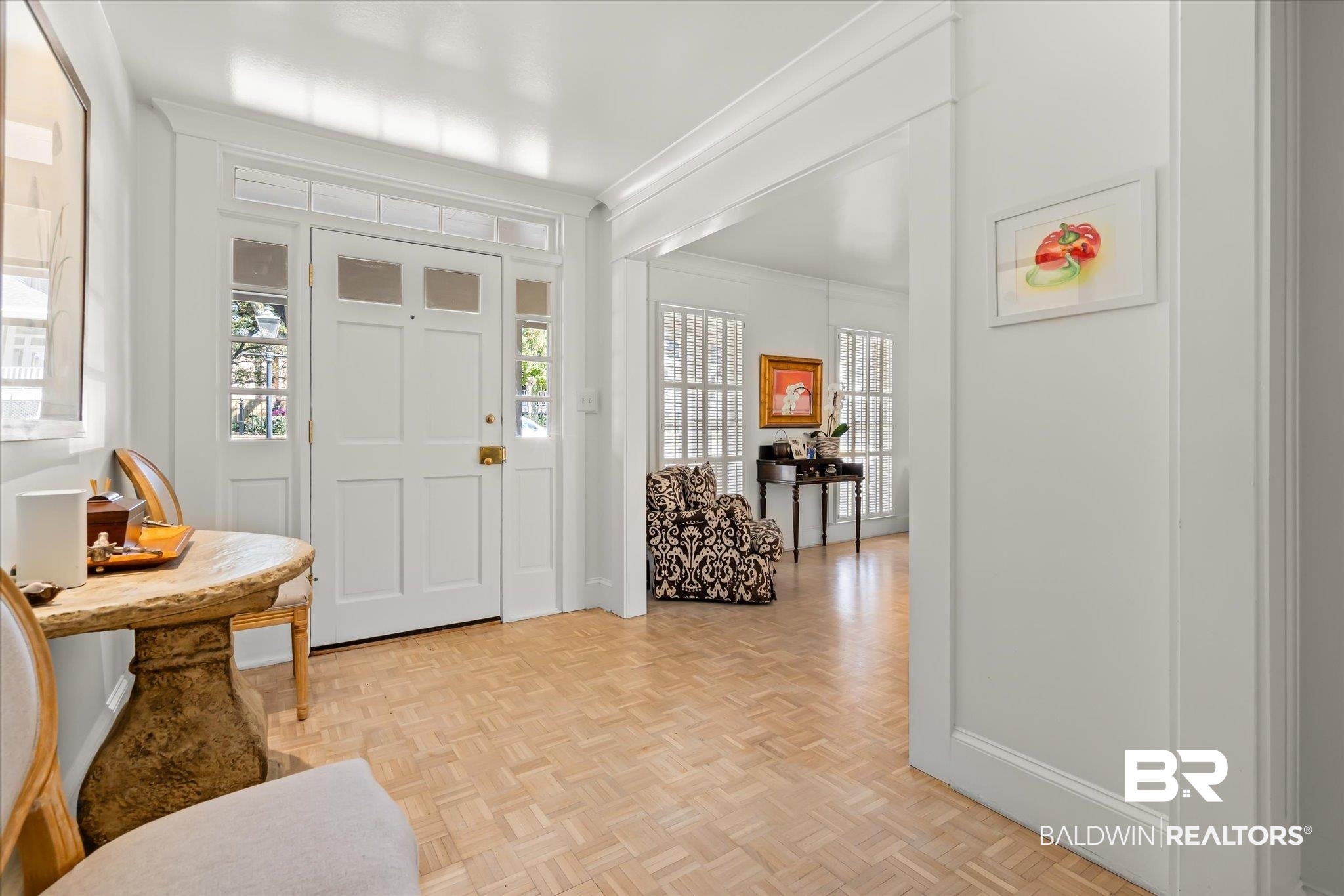 3921 McGregor Court Mobile, AL 36608 - Photo 2 of 41 Entrance foyer with a healthy amount of sunlight, crown molding, and baseboards