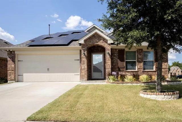 a house view with a outdoor space