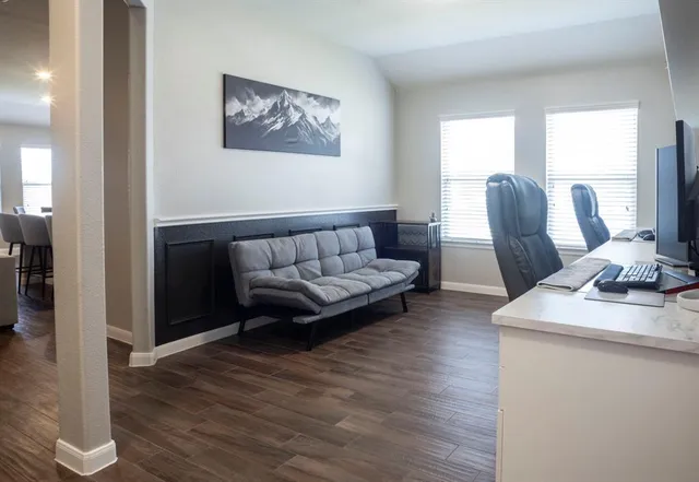 a bathroom with a double vanity sink and mirror