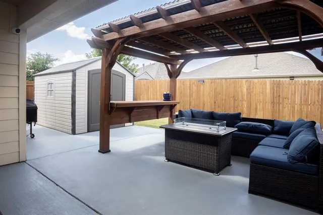 a view of living room with furniture and a couch