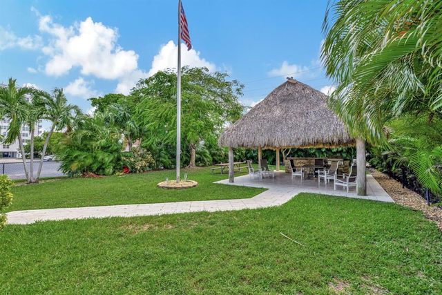 a view of an chairs and tables in the patio