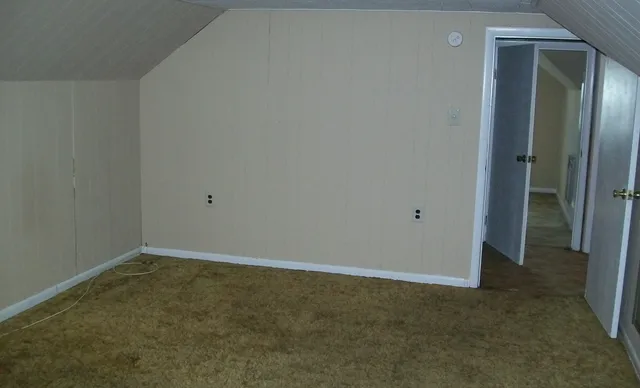 an empty room with closet