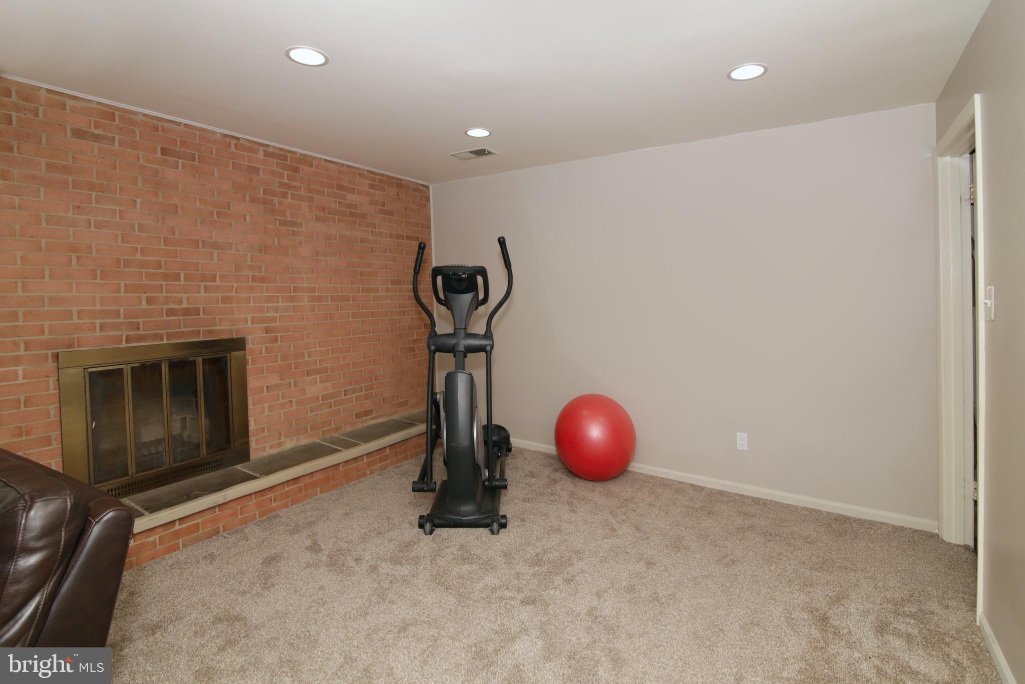 8837 Stark Road Annandale, VA 22003 - Photo 24 of 31 LL Family Room with Fireplace