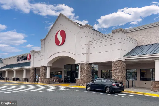a view of street with sitting area
