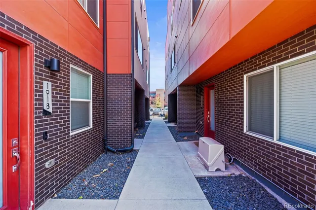 a view of entryway with stairs and wooden floor