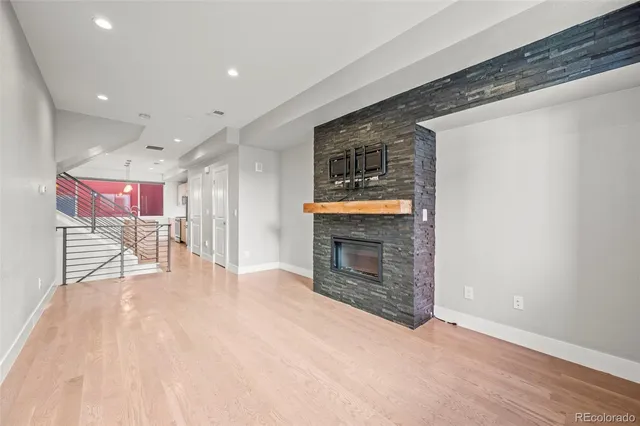 a kitchen with kitchen island a sink appliances a counter and cabinets