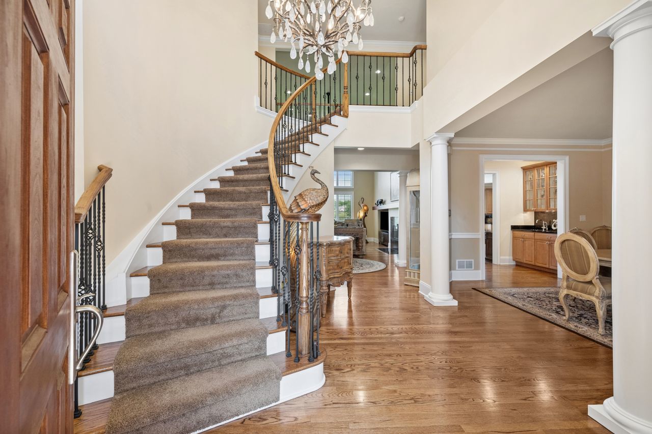 1029 Ridgeview Drive Inverness, IL 60010 - Photo 5 of 58 a view of entryway and hall with wooden floor