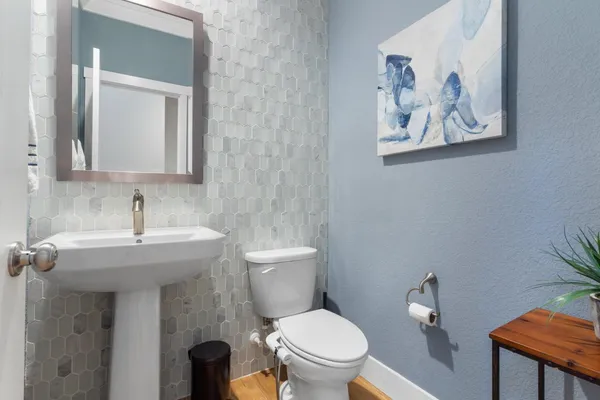 a bedroom with a large bed and a walk in closet