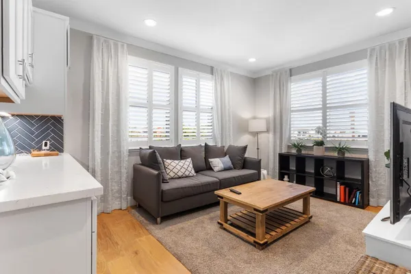 a bathroom with a sink vanity and a mirror