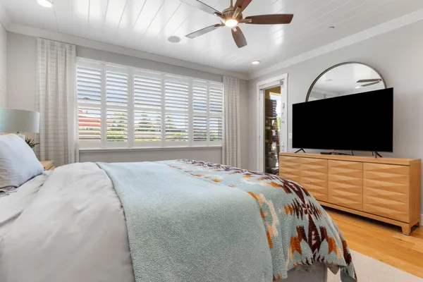 a kitchen with stainless steel appliances a refrigerator and a stove top oven