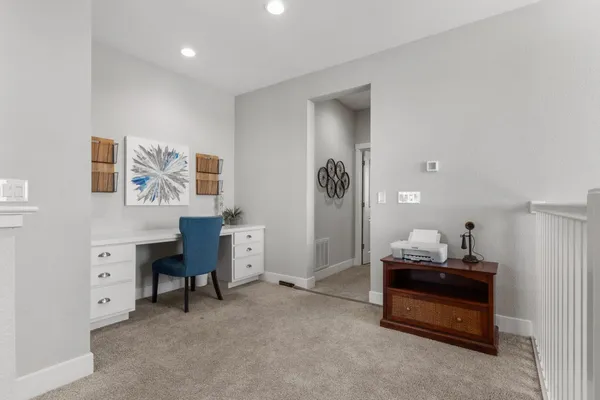 a kitchen with stainless steel appliances granite countertop a refrigerator and cabinets