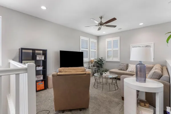 a kitchen with granite countertop a sink stainless steel appliances and cabinets