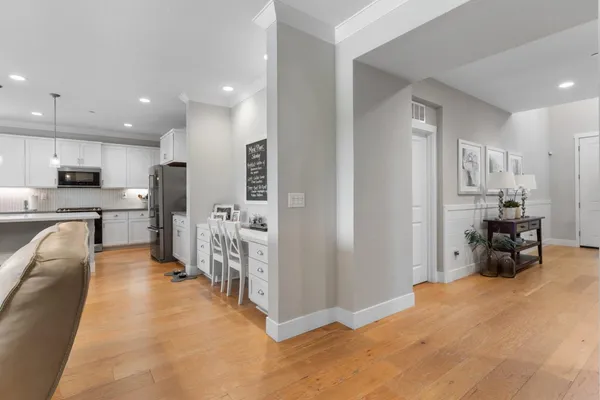 an aerial view of a residential building and lake view