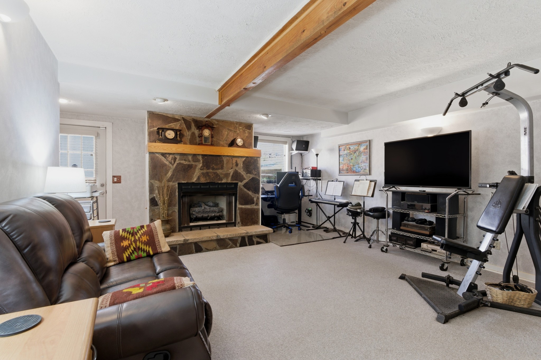 551 Mt Pleasant Road Kingston Springs, TN 37082 - Photo 20 of 68 a living room with furniture and a flat screen tv