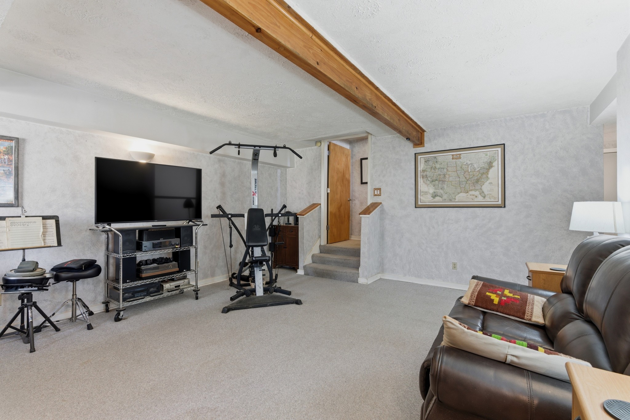 551 Mt Pleasant Road Kingston Springs, TN 37082 - Photo 21 of 68 a view of a livingroom with furniture and a flat screen tv