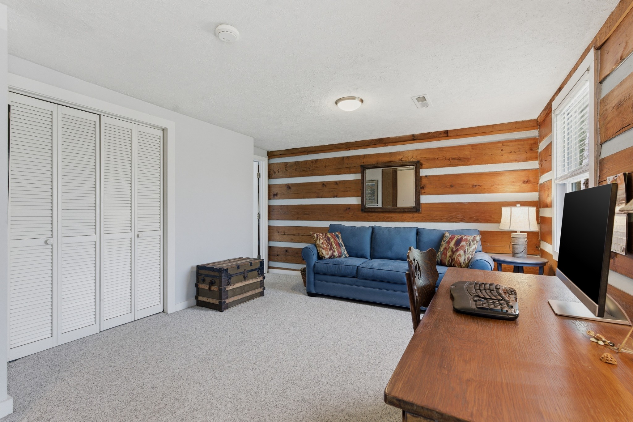 551 Mt Pleasant Road Kingston Springs, TN 37082 - Photo 26 of 68 a living room with furniture and a flat screen tv