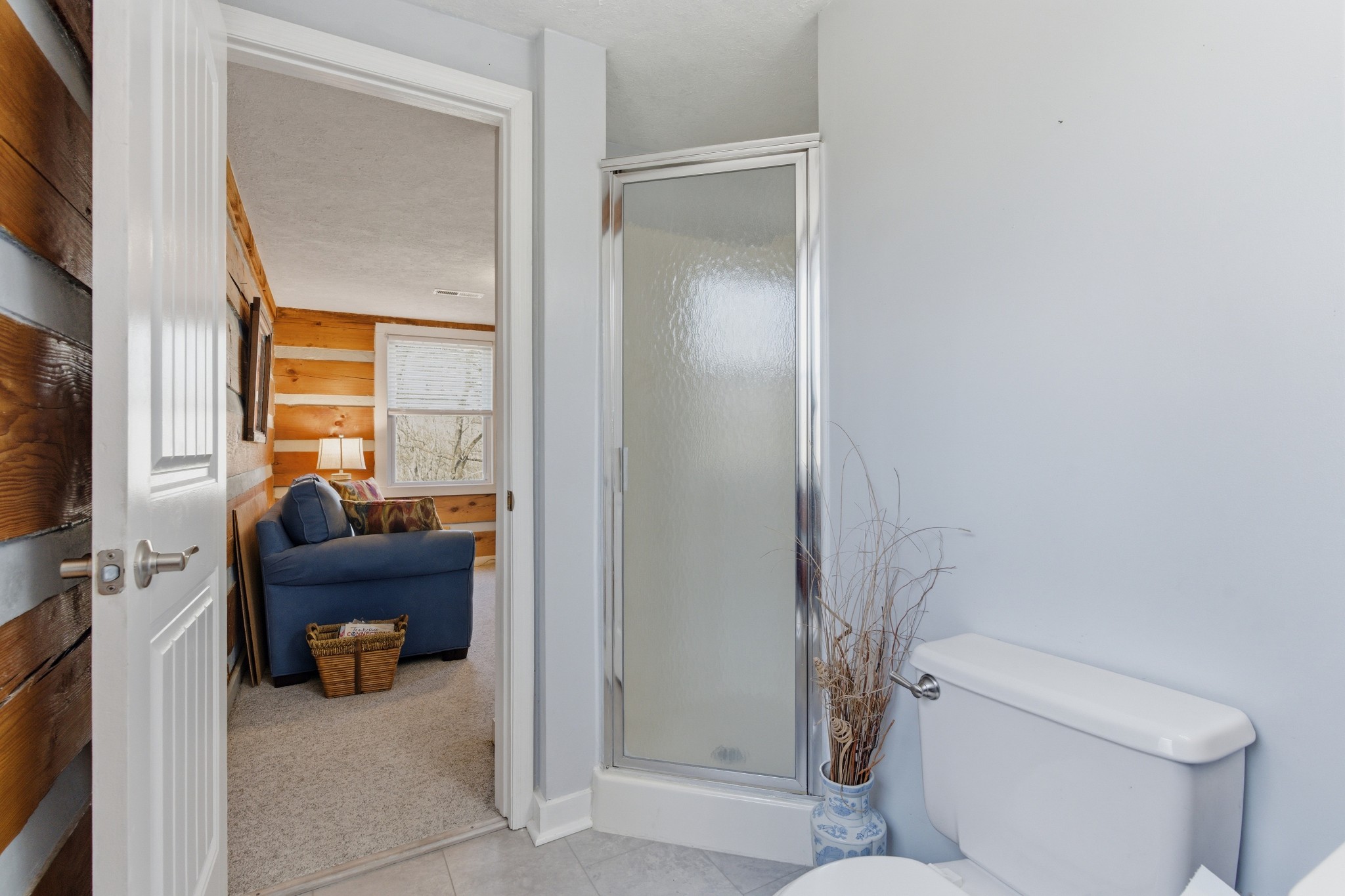 551 Mt Pleasant Road Kingston Springs, TN 37082 - Photo 28 of 68 a living room with furniture and a toilet