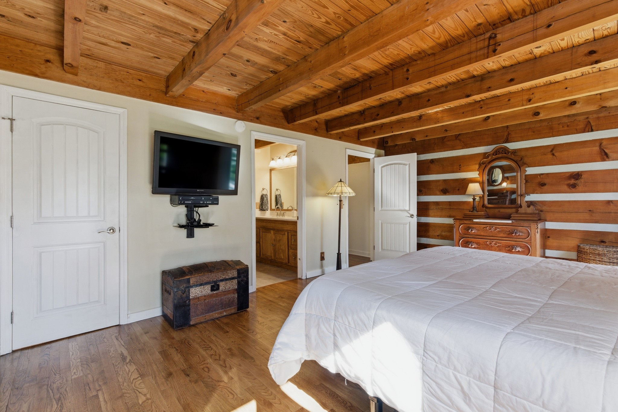 551 Mt Pleasant Road Kingston Springs, TN 37082 - Photo 31 of 68 a spacious bedroom with a bed and a flat screen tv