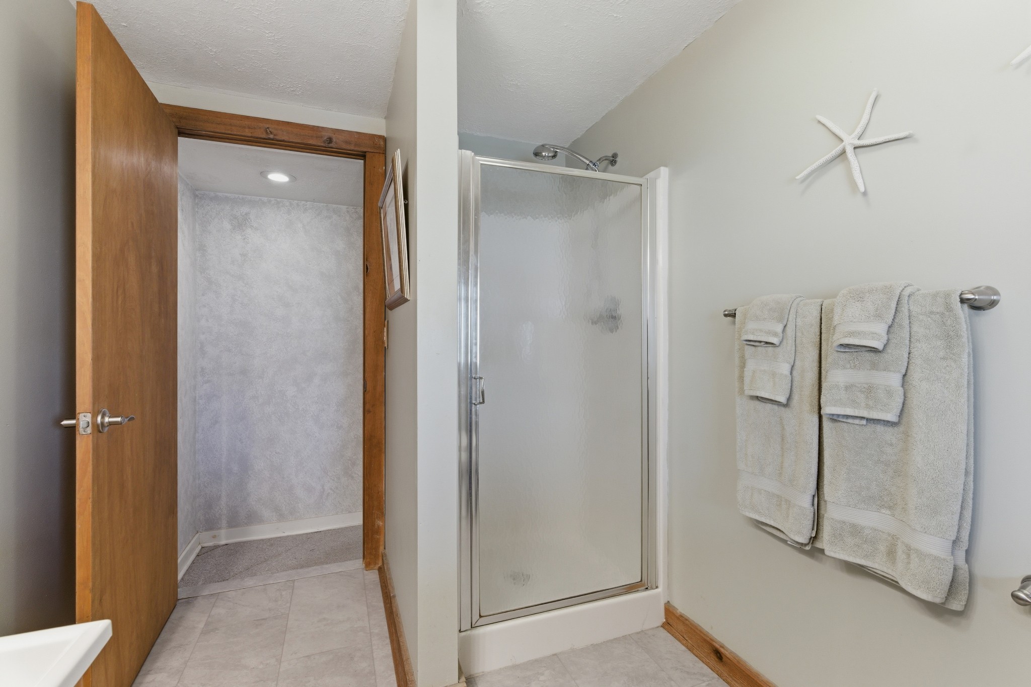 551 Mt Pleasant Road Kingston Springs, TN 37082 - Photo 34 of 68 a bathroom with a shower and a glass door