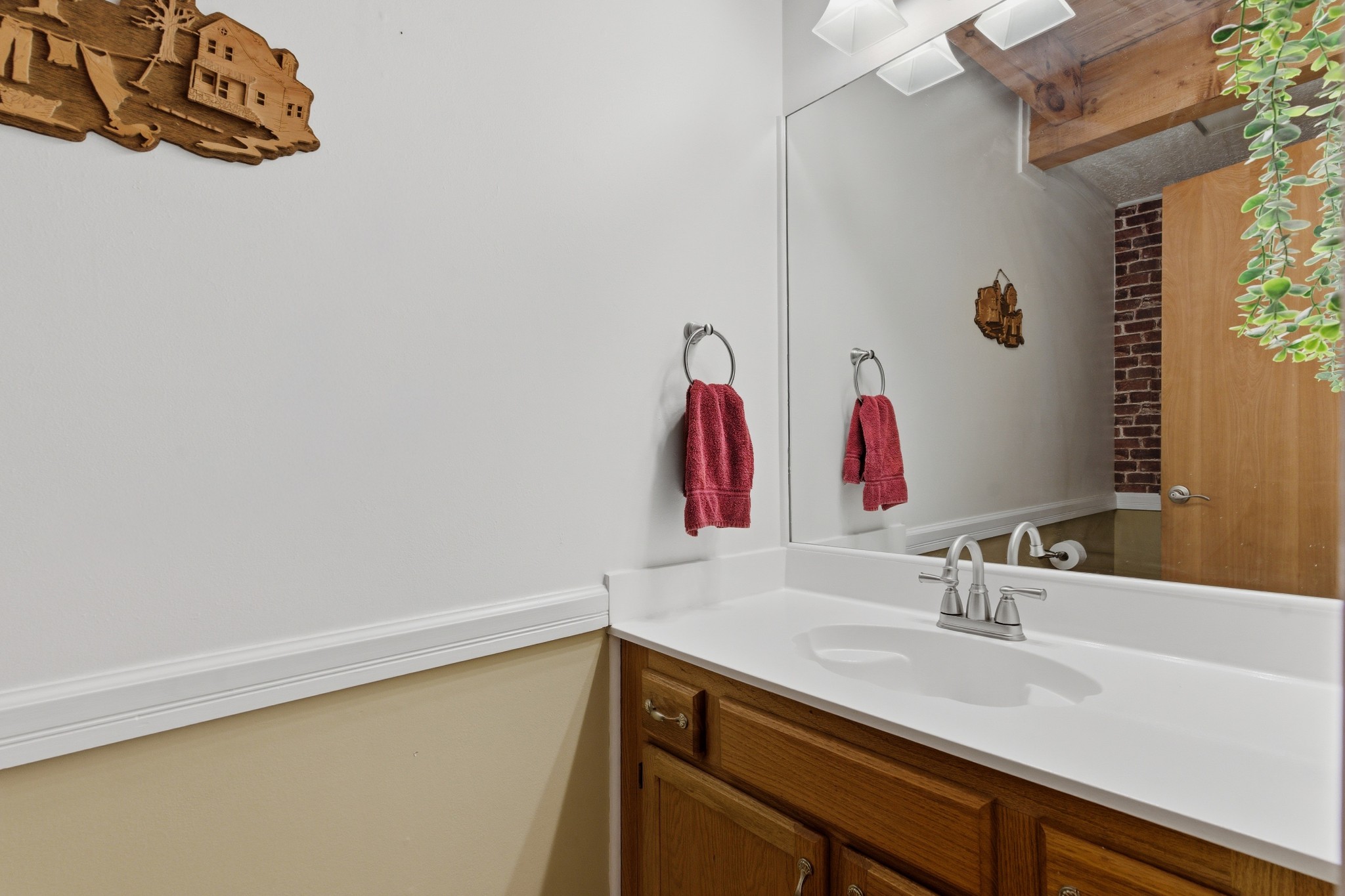 551 Mt Pleasant Road Kingston Springs, TN 37082 - Photo 35 of 68 a bathroom with a sink and a mirror