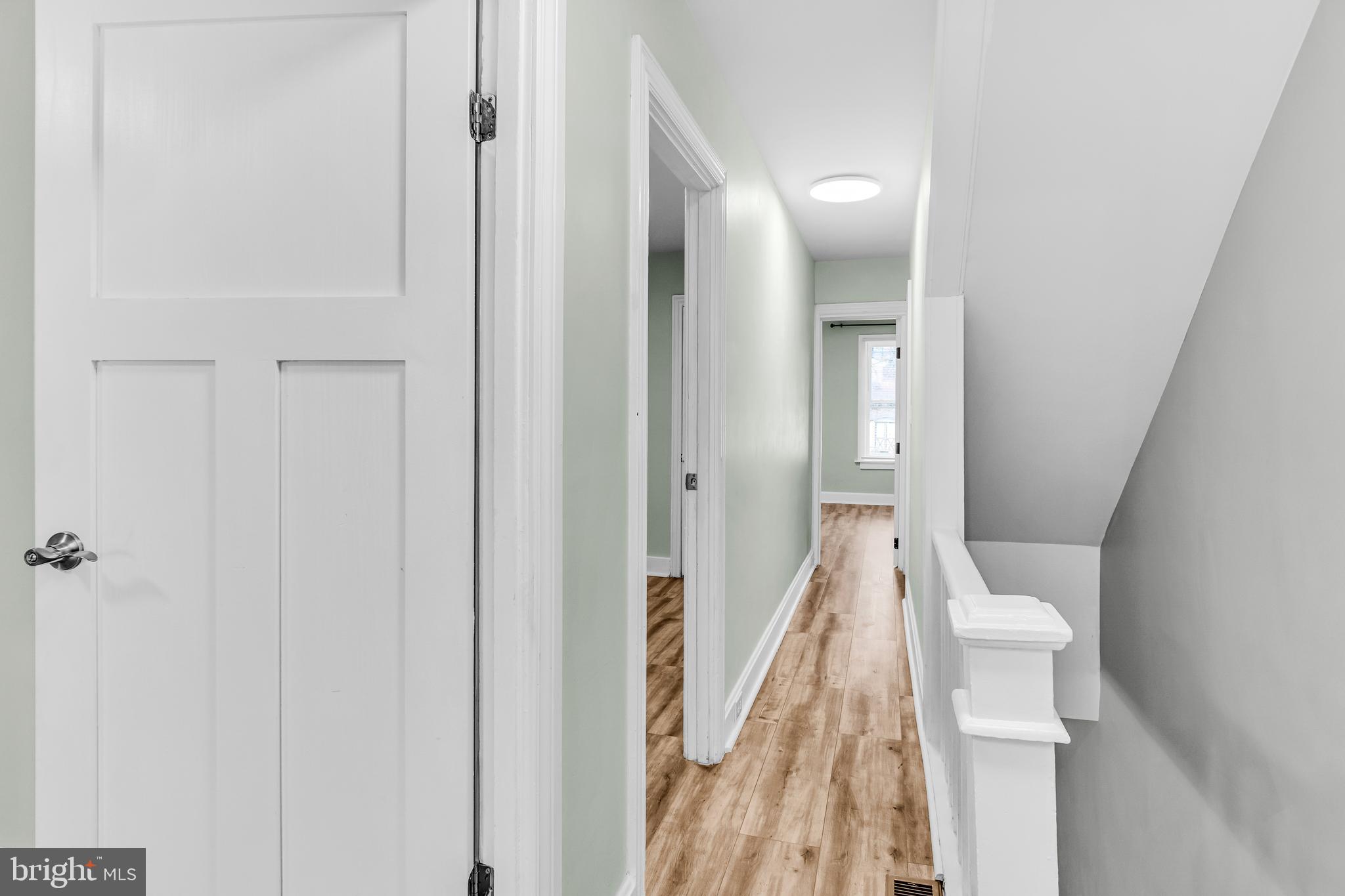 726 South 2nd Street Steelton, PA 17113 - Photo 15 of 25 a view of a hallway with a white walls and a white door
