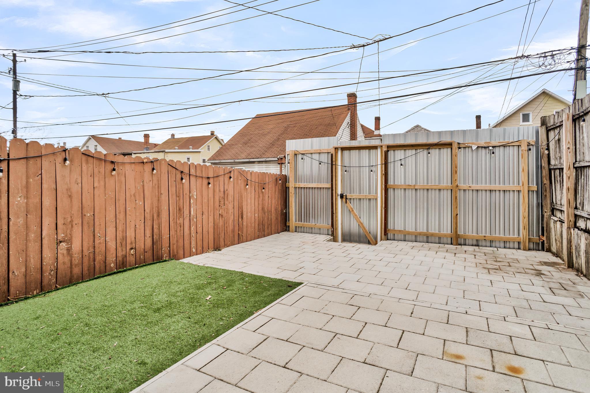 726 South 2nd Street Steelton, PA 17113 - Photo 24 of 25 a backyard of a house with wooden fence