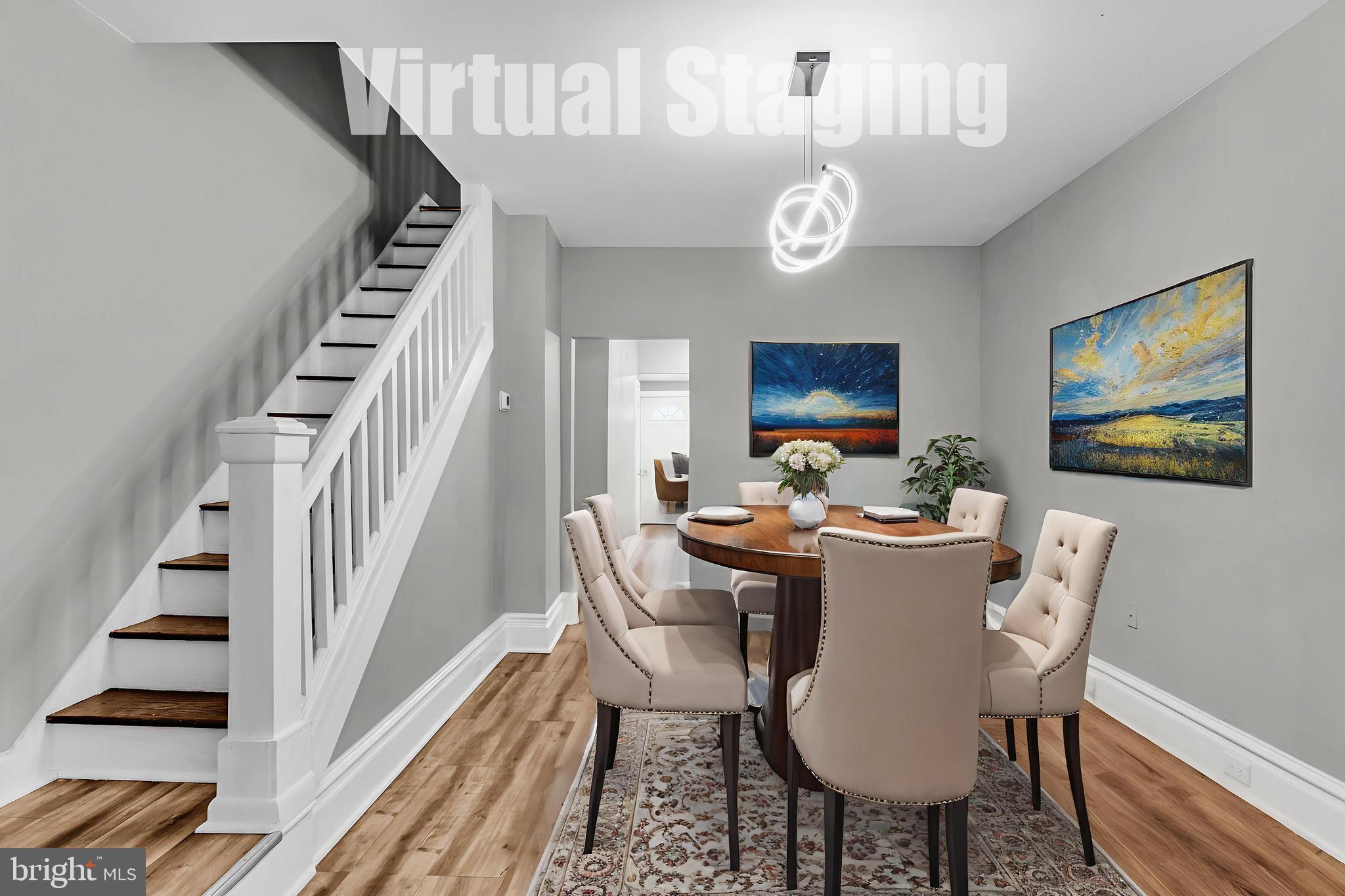 726 South 2nd Street Steelton, PA 17113 - Photo 3 of 25 a view of a dining room with furniture wooden floor and a chandelier