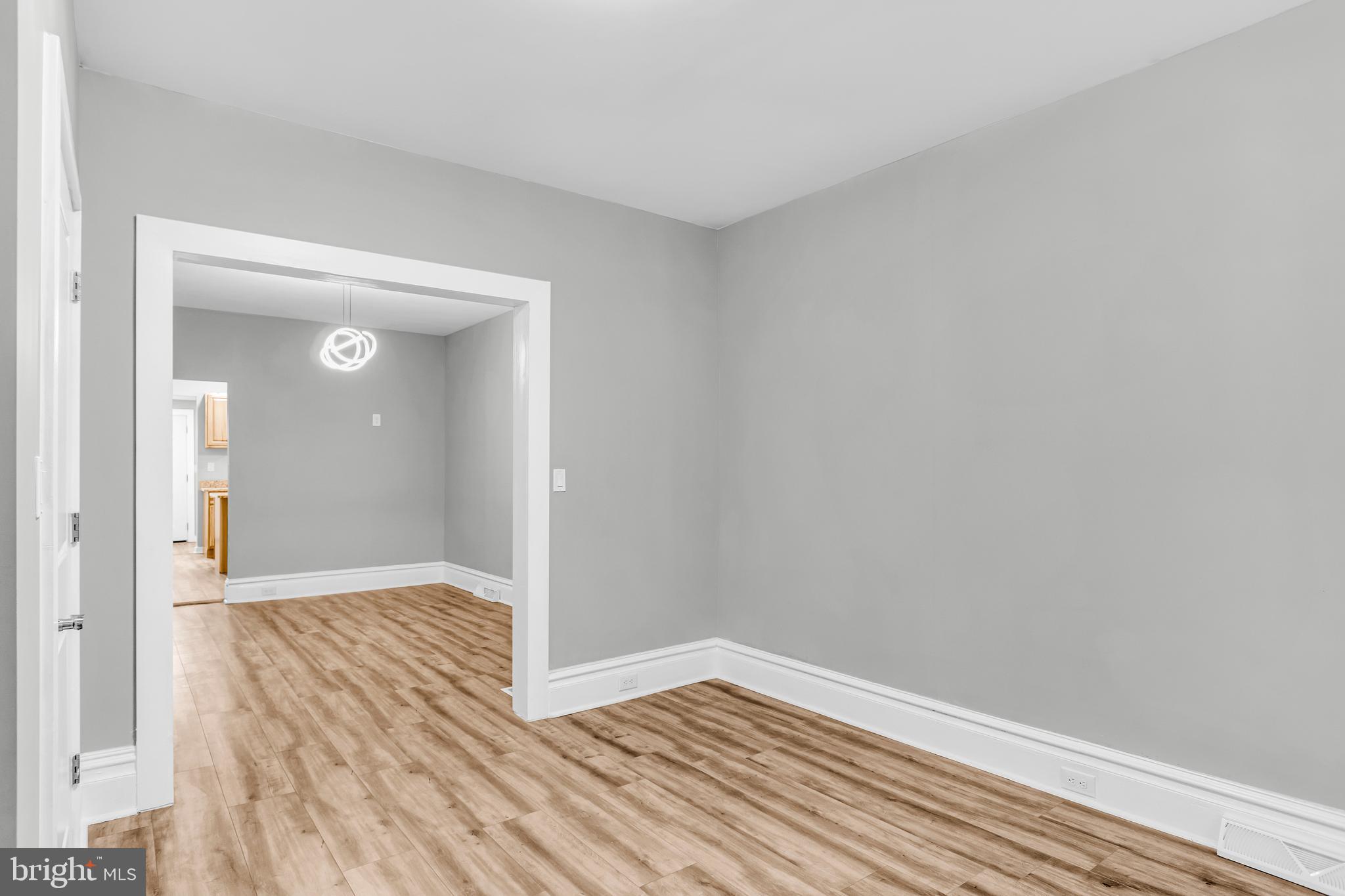 726 South 2nd Street Steelton, PA 17113 - Photo 4 of 25 wooden floor in a empty room