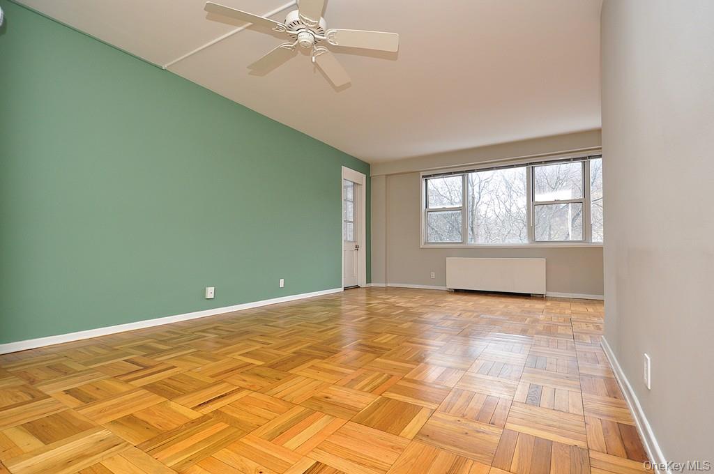 260 Garth Road, Unit 4G5 Scarsdale, NY 10583 - Photo 13 of 48 a view of an empty room with a window
