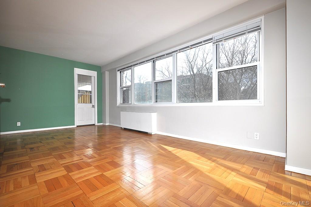 260 Garth Road, Unit 4G5 Scarsdale, NY 10583 - Photo 21 of 48 a view of an empty room with a window