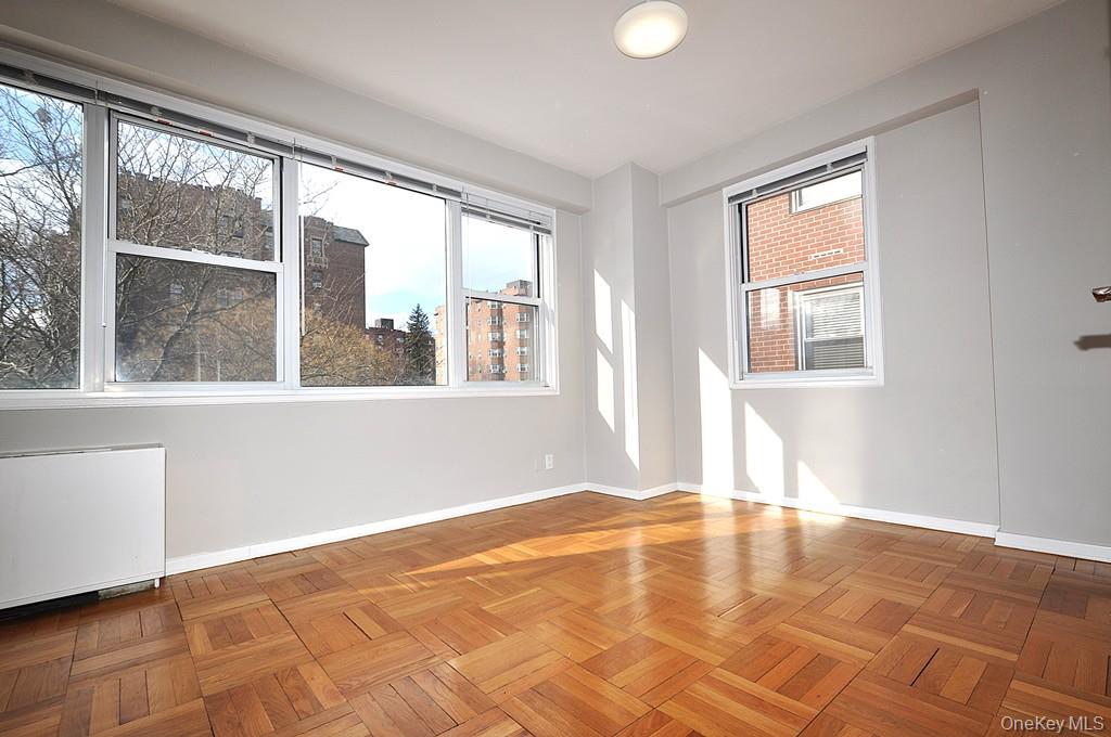 260 Garth Road, Unit 4G5 Scarsdale, NY 10583 - Photo 22 of 48 a view of an empty room with a window