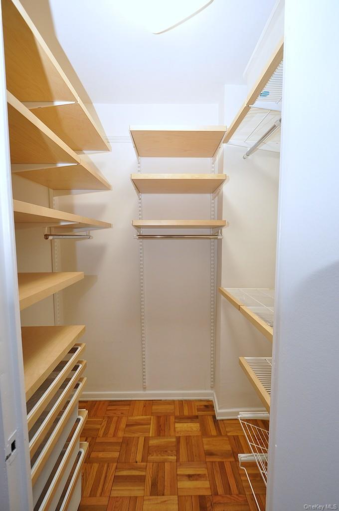 260 Garth Road, Unit 4G5 Scarsdale, NY 10583 - Photo 32 of 48 a view of an empty walk in closet